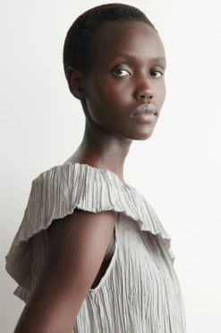 ASYMMETRIC PLEATED SILK GOWN