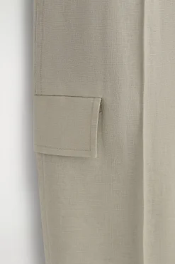 BELTED LINEN BARREL-LEG PANTS