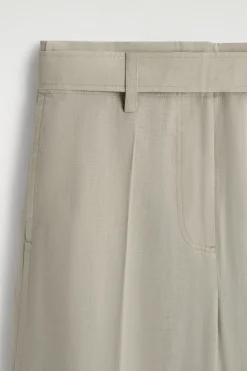 BELTED LINEN BARREL-LEG PANTS
