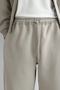 COTTON-PIQUÉ OVERSIZED BARREL-LEG JOGGERS
