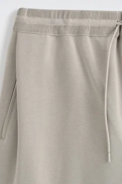 COTTON-PIQUÉ OVERSIZED BARREL-LEG JOGGERS