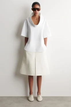 EXAGGERATED MOCK-NECK TOP