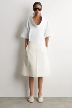 EXAGGERATED MOCK-NECK TOP