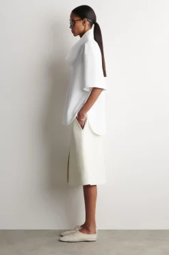 EXAGGERATED MOCK-NECK TOP
