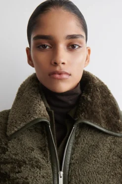 LEATHER-BONDED SHEARLING LONG COAT