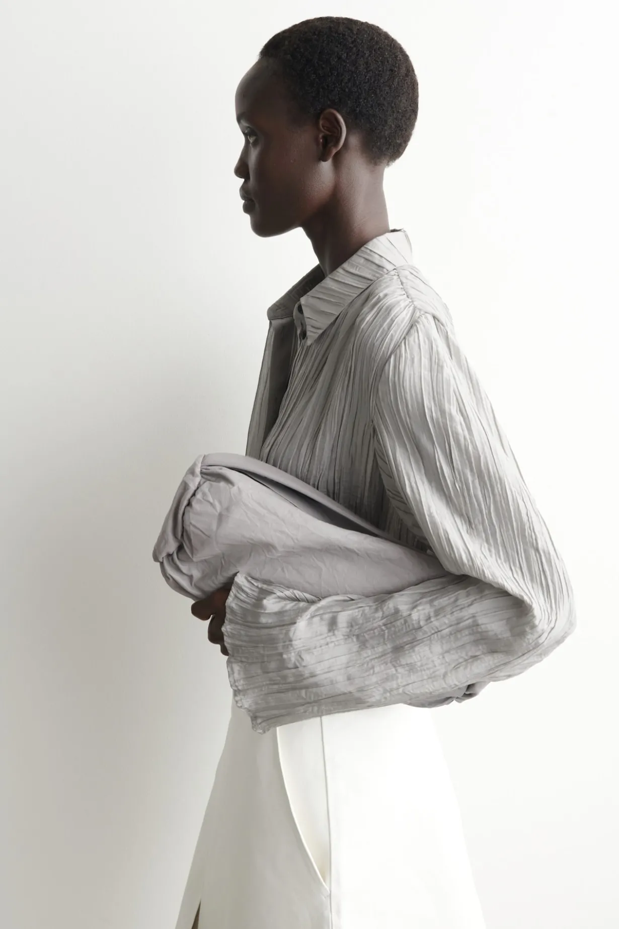MINI CYLINDER CLUTCH BAG - TEXTURED-LEATHER