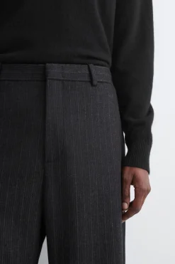 PINSTRIPED WOOL RELAXED-FIT TAPERED PANTS