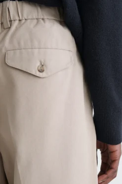 PLEATED RELAXED-FIT TAPERED PANTS