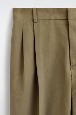 PLEATED RELAXED-FIT TAPERED PANTS