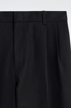 PLEATED RELAXED-FIT TAPERED PANTS