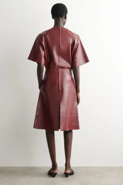 PLEATED TEXTURED-LEATHER MIDI SKIRT