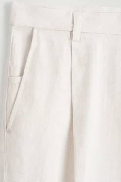 PLEATED WIDE-LEG DENIM PANTS