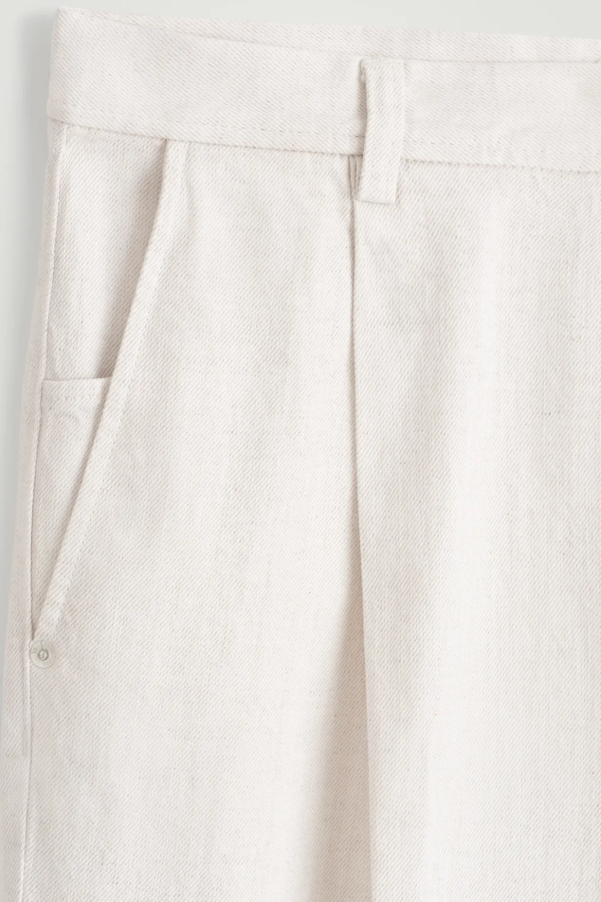 PLEATED WIDE-LEG DENIM PANTS
