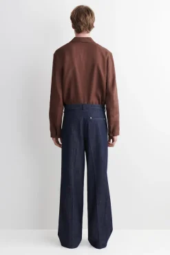 PLEATED WIDE-LEG DENIM PANTS