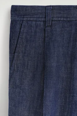 PLEATED WIDE-LEG DENIM PANTS