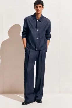 PLEATED WIDE-LEG DENIM PANTS