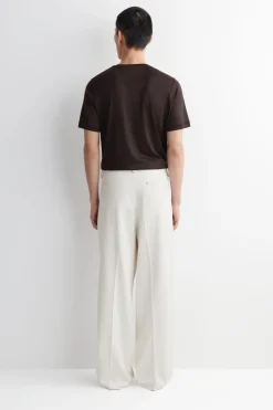 PLEATED WIDE-LEG DENIM PANTS