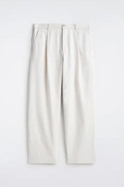 PLEATED WIDE-LEG DENIM PANTS