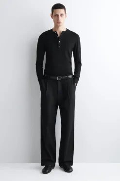 PLEATED WIDE-LEG DENIM PANTS