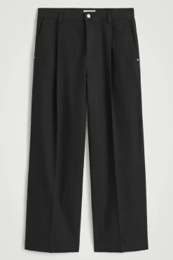 PLEATED WIDE-LEG DENIM PANTS
