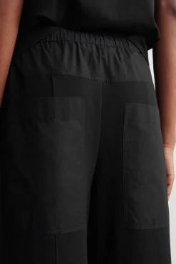 POPLIN-PANELLED JERSEY PANTS