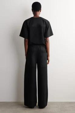 POPLIN-PANELLED JERSEY PANTS