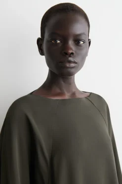 SCULPTURAL MINI DRESS