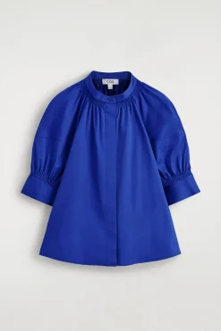SMOCKED PUFF-SLEEVE BLOUSE