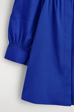 SMOCKED PUFF-SLEEVE BLOUSE