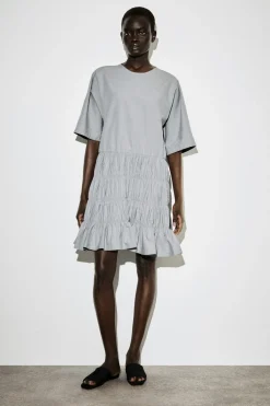 SMOCKED SEERSUCKER MINI DRESS