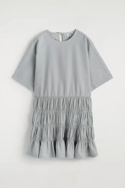 SMOCKED SEERSUCKER MINI DRESS