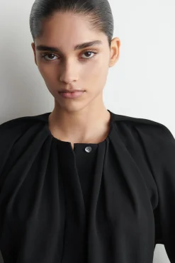 VOLUMINOUS PLEATED BLOUSE